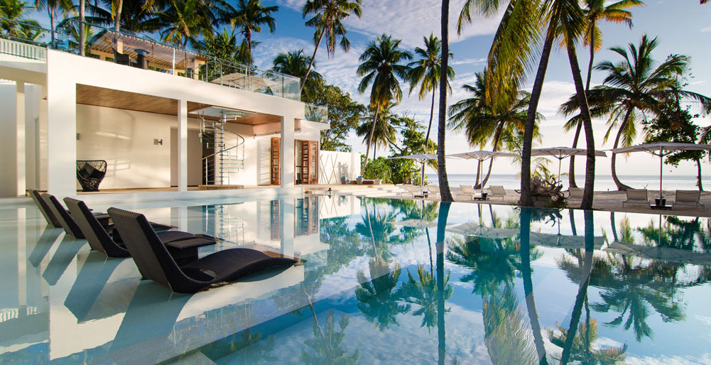 Amilla Beach Residences - The Amilla Estate - Pool deck and sunloungers